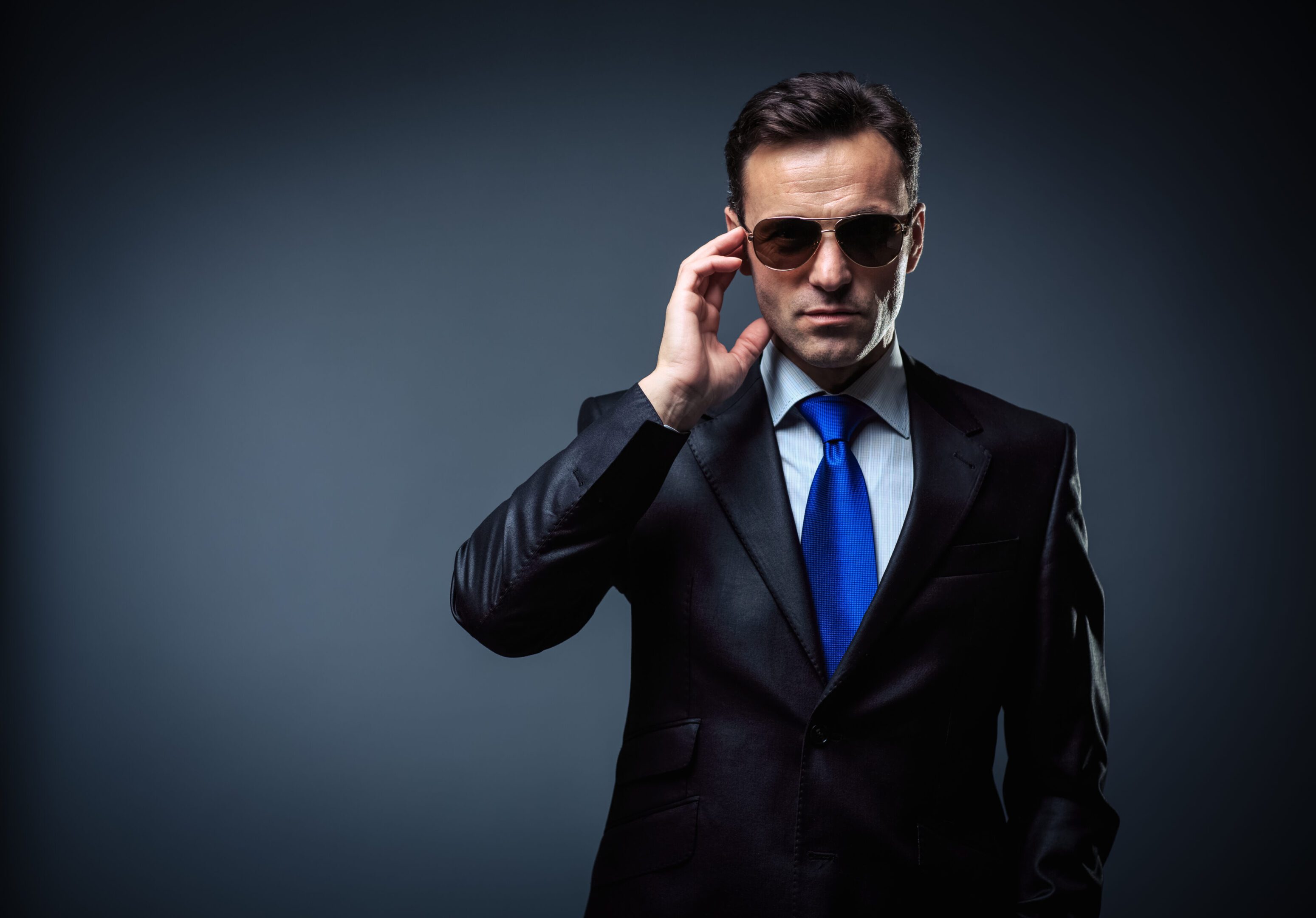 Bodyguard Bodyguard in suit and sunglasses